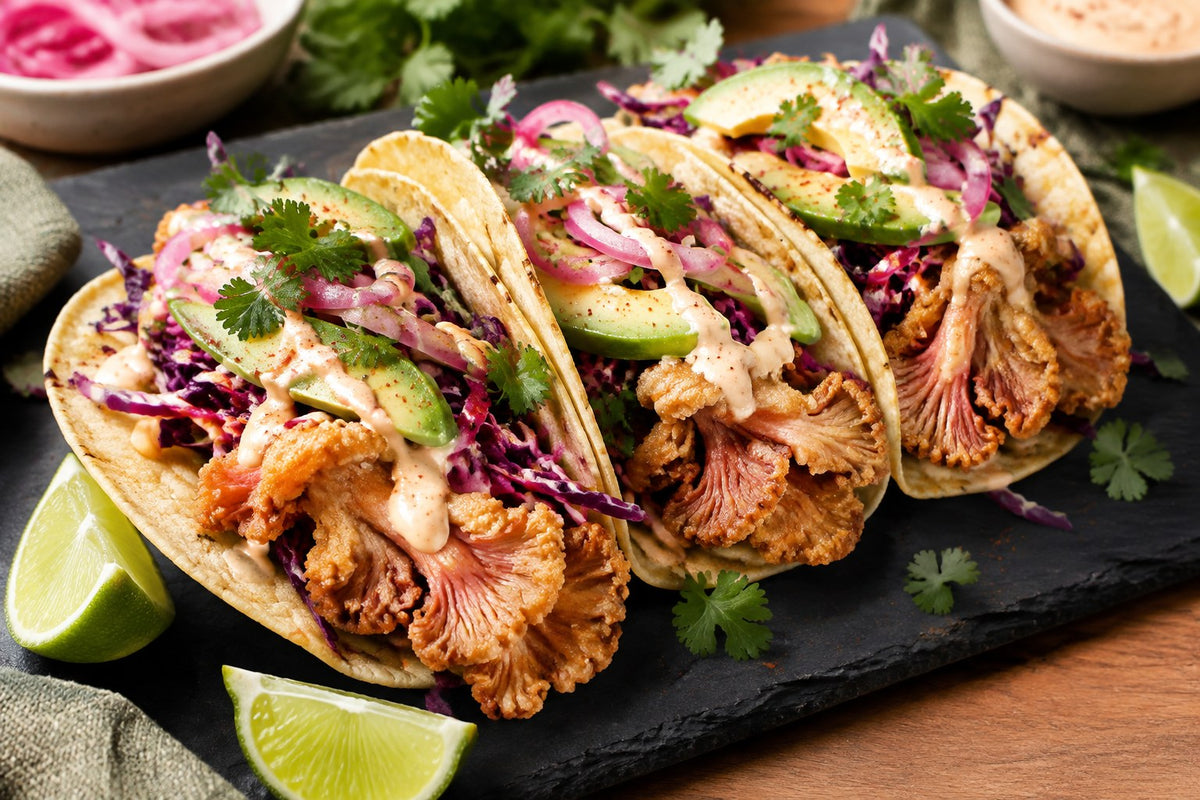 Crispy pink oyster mushroom tacos with avocado, slaw and pickled onion